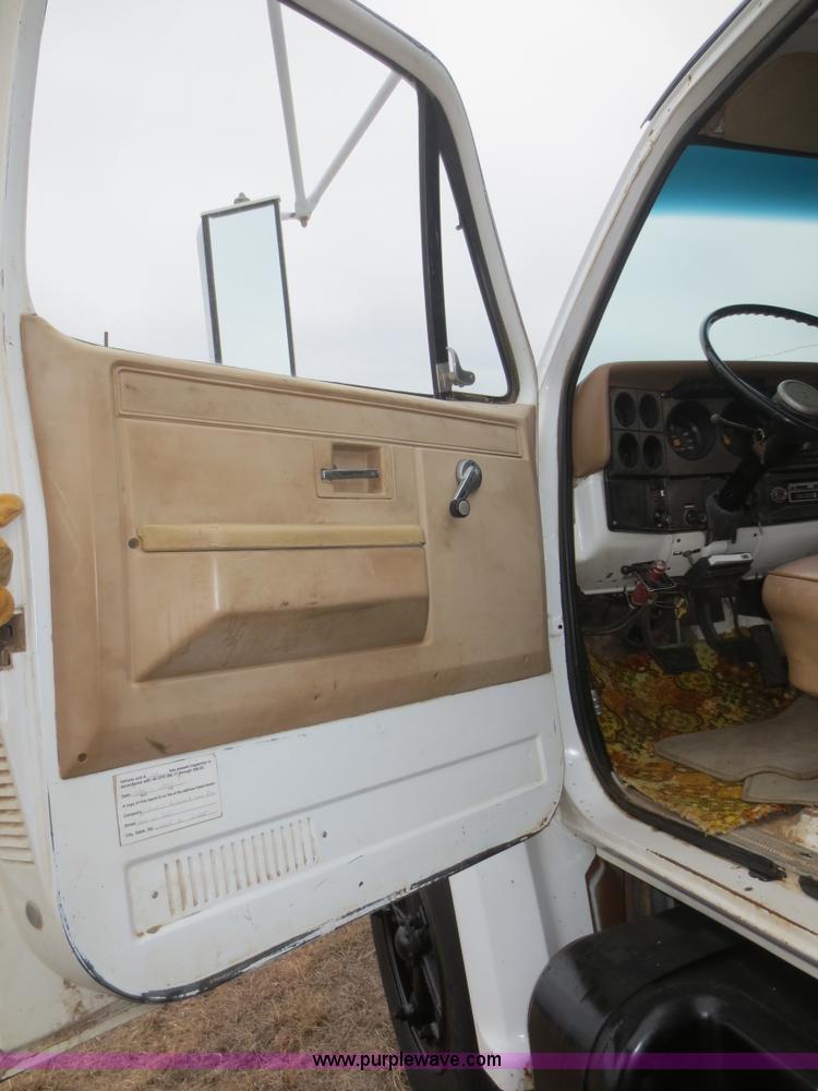 image for item F8140 1984 GMC TopKick winch truck