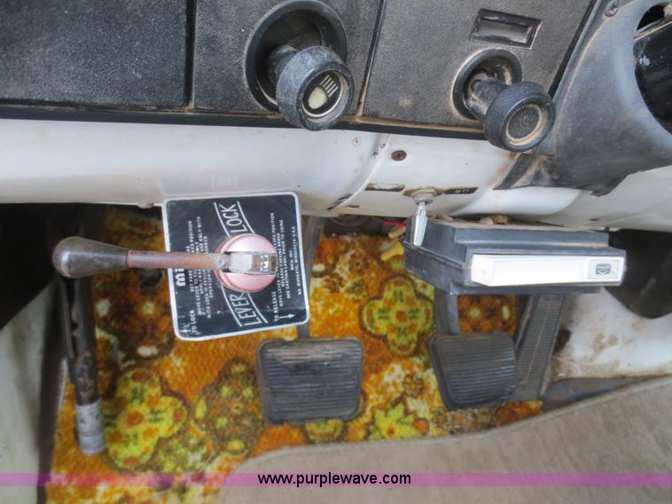 image for item F8140 1984 GMC TopKick winch truck