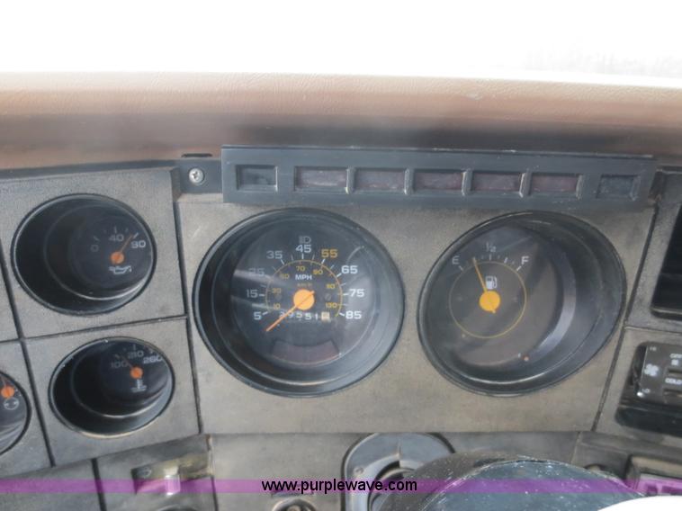 image for item F8140 1984 GMC TopKick winch truck