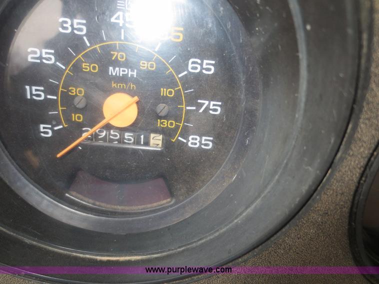 image for item F8140 1984 GMC TopKick winch truck