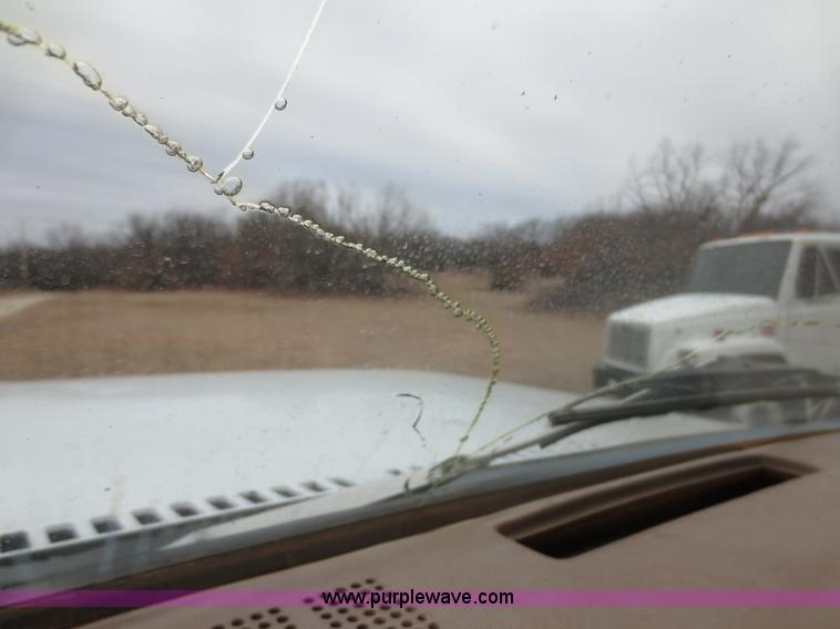 image for item F8140 1984 GMC TopKick winch truck