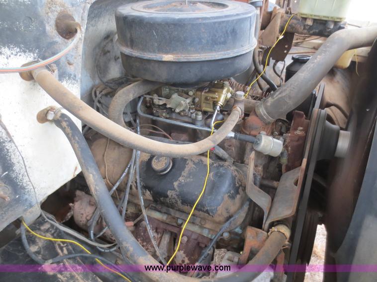 image for item F8140 1984 GMC TopKick winch truck