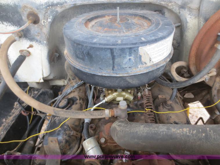 image for item F8140 1984 GMC TopKick winch truck