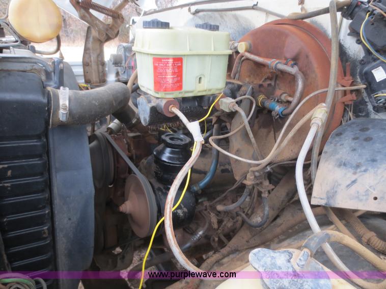 image for item F8140 1984 GMC TopKick winch truck