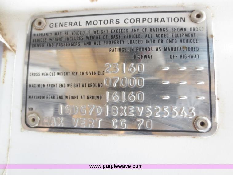 image for item F8140 1984 GMC TopKick winch truck