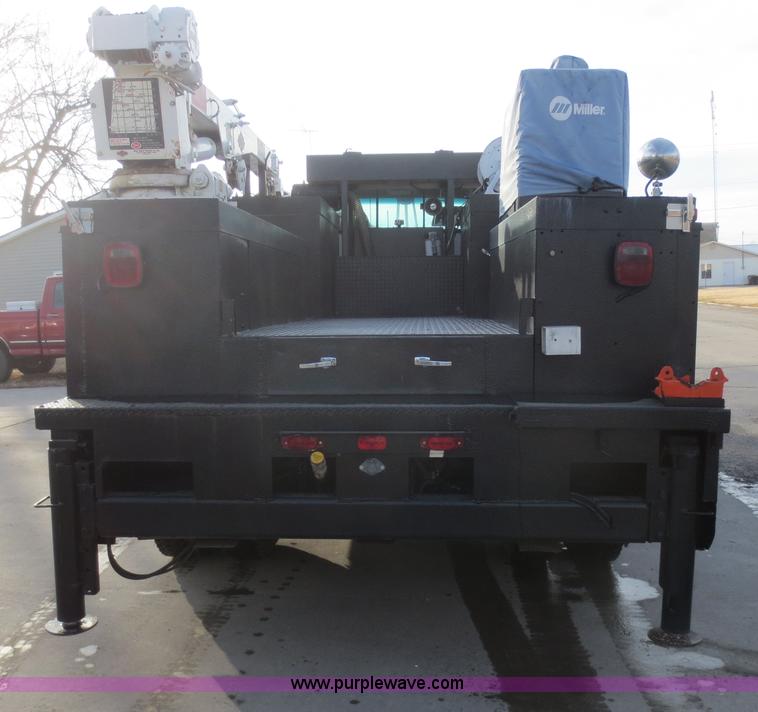 image for item F8172 1999 GMC C7500 service truck