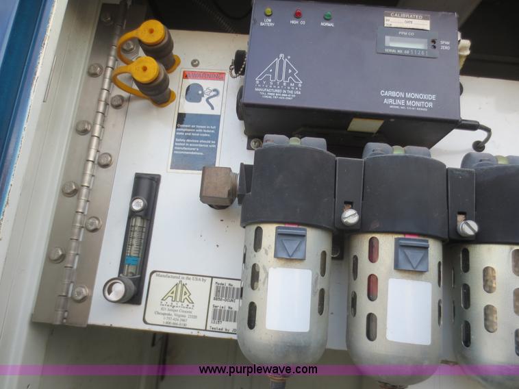 image for item F8172 1999 GMC C7500 service truck