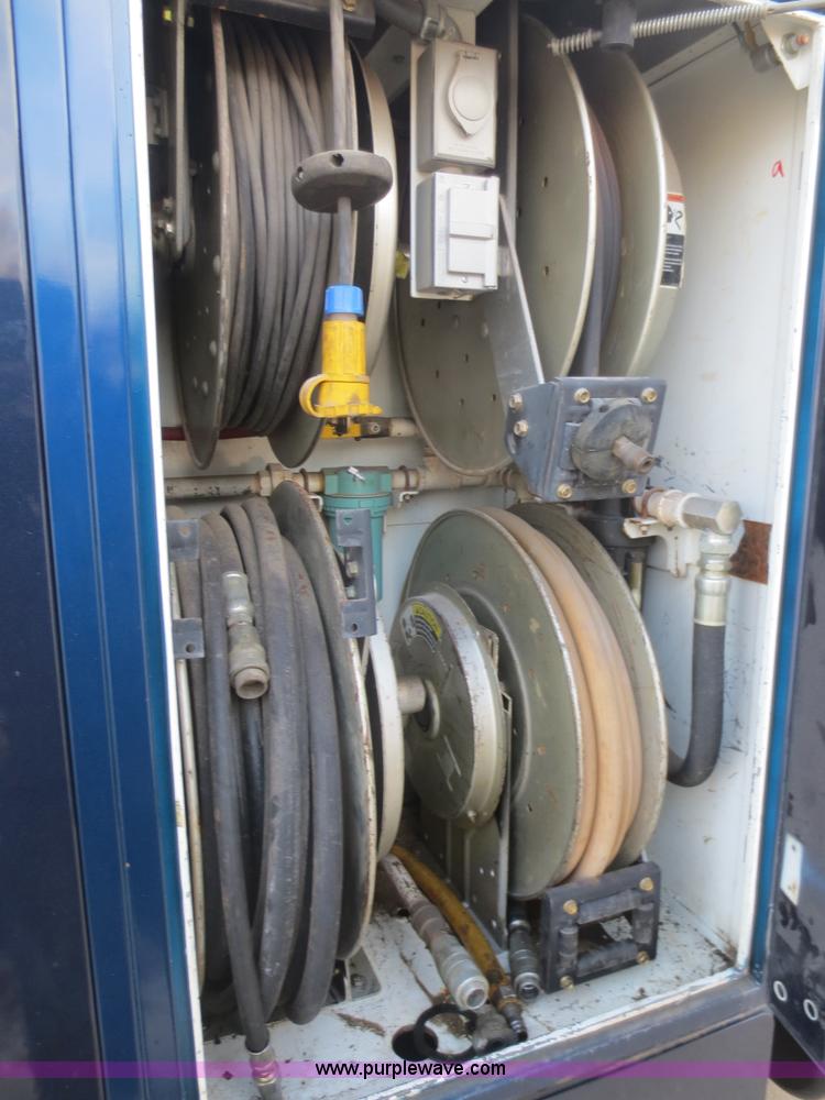 image for item F8172 1999 GMC C7500 service truck