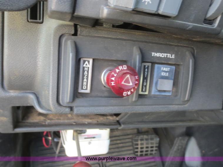 image for item F8172 1999 GMC C7500 service truck