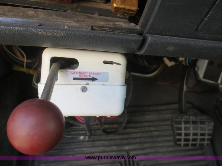 image for item F8172 1999 GMC C7500 service truck