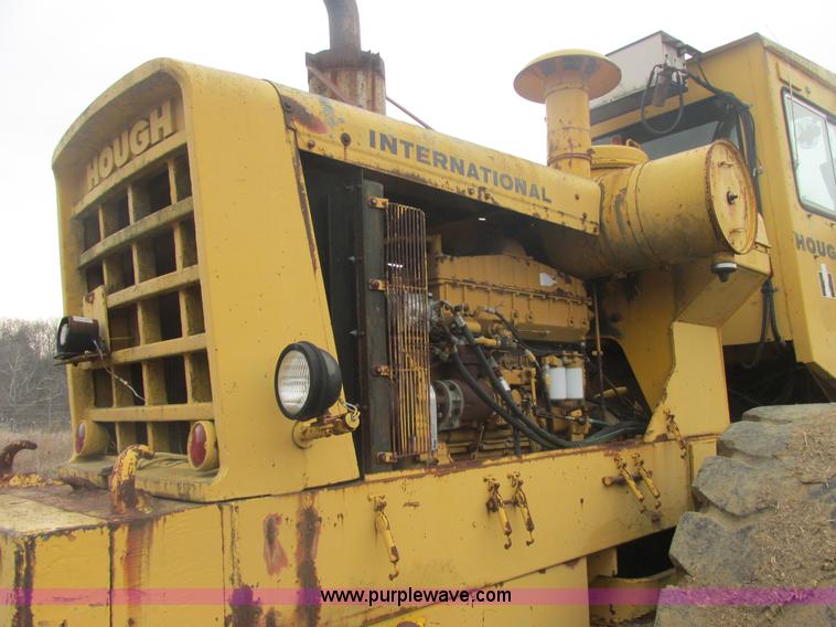 image for item H7741 International H100 Series C articulating loader