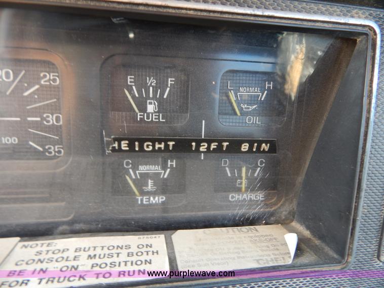 image for item I1238 1992 Ford F900 crane dump truck