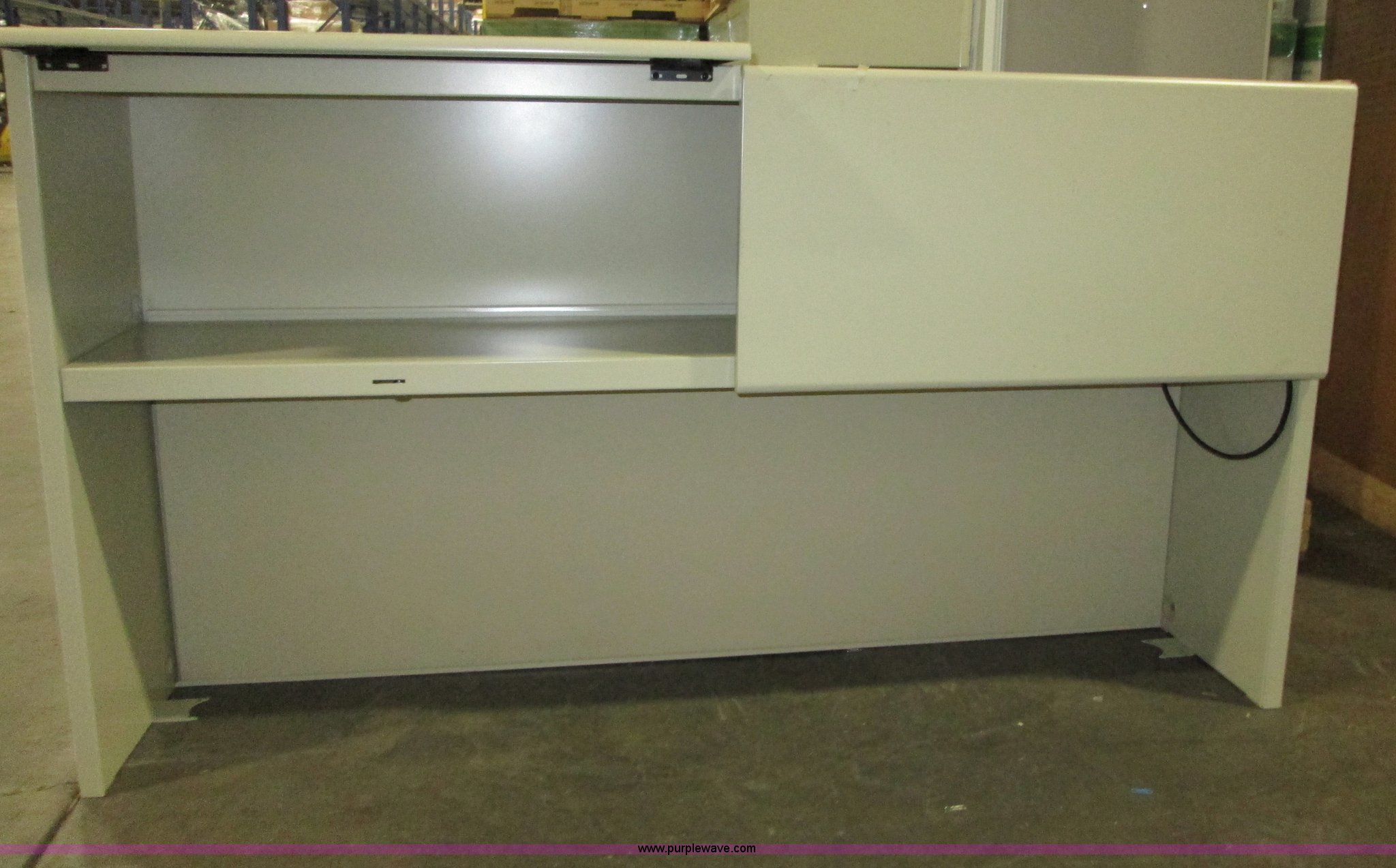 (2) metal desk hutches with lights in Lawrence, KS Item C1828 sold Purple Wave