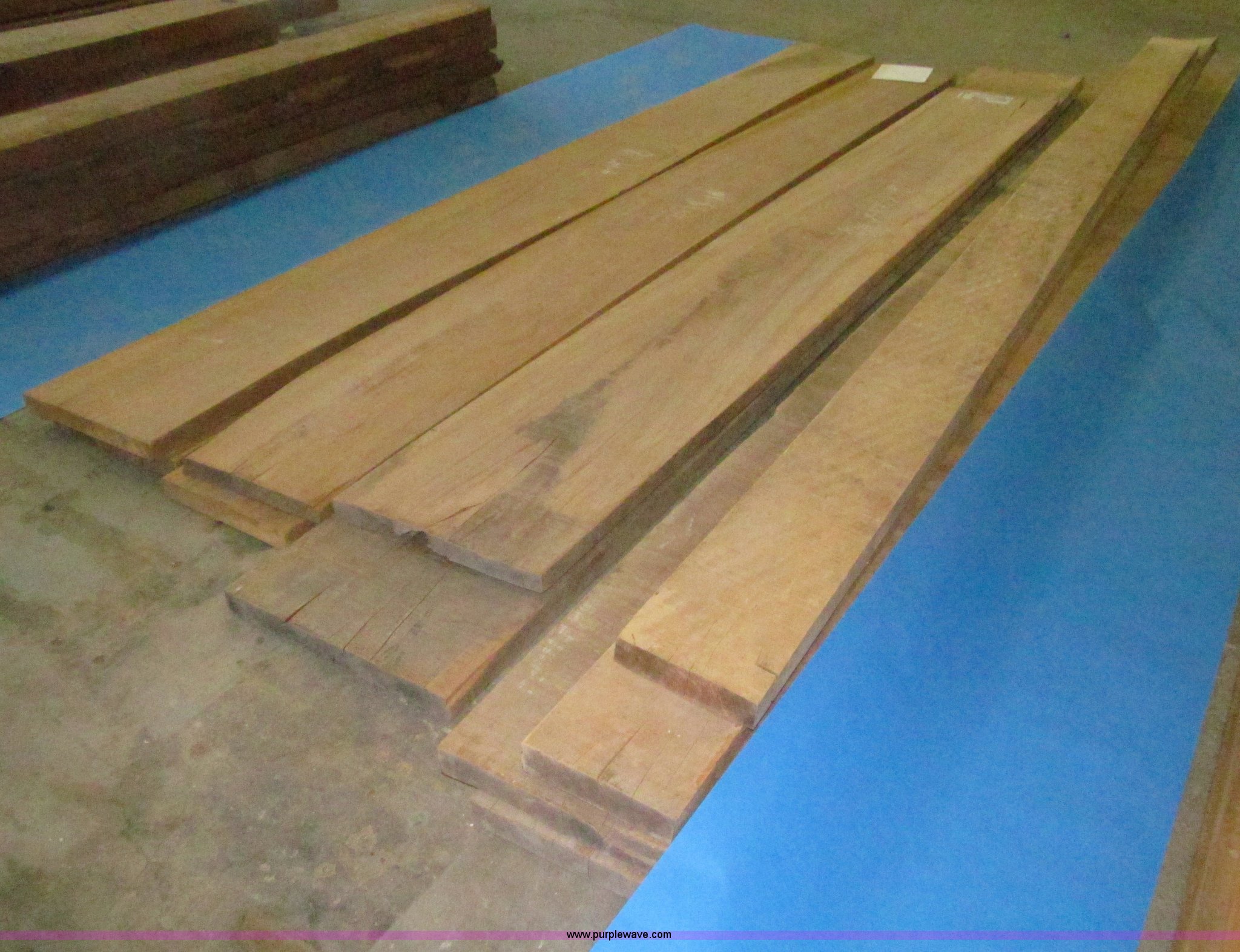 Red gum lumber in Des Moines, IA Item E4657 sold Purple Wave