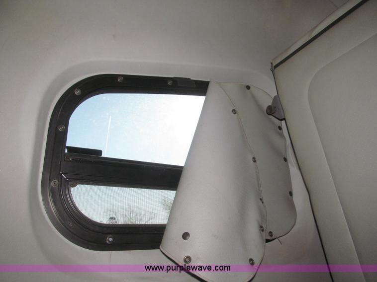 image for item F7259 2001 Freightliner Century Class ST120 semi truck