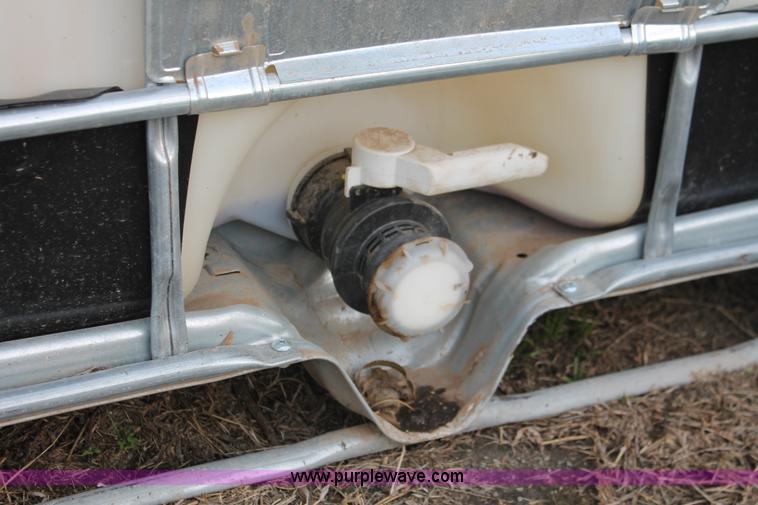 image for item H8312 (6) 250 gallon poly tanks