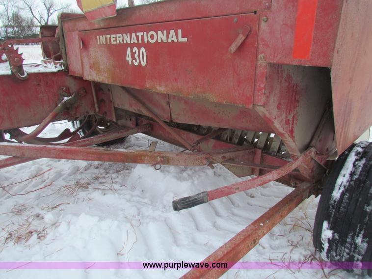 image for item AJ9461 International 430 square baler and Farmhand accumulator