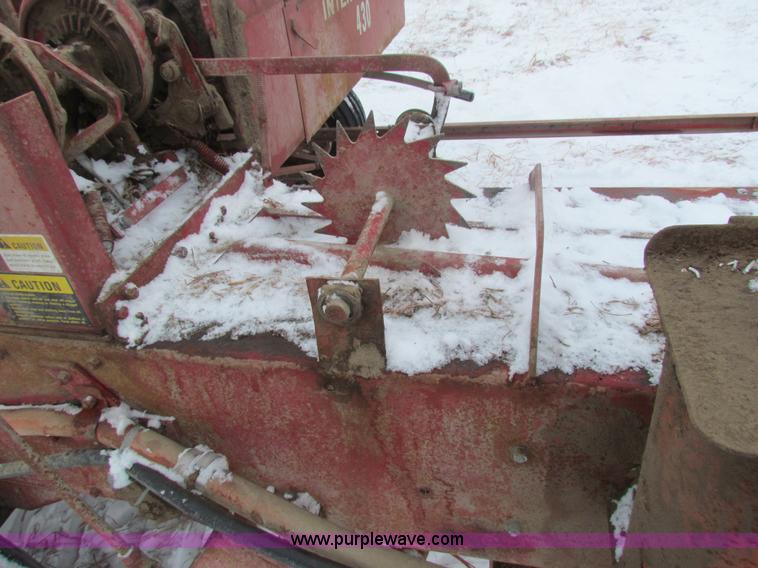 image for item AJ9461 International 430 square baler and Farmhand accumulator