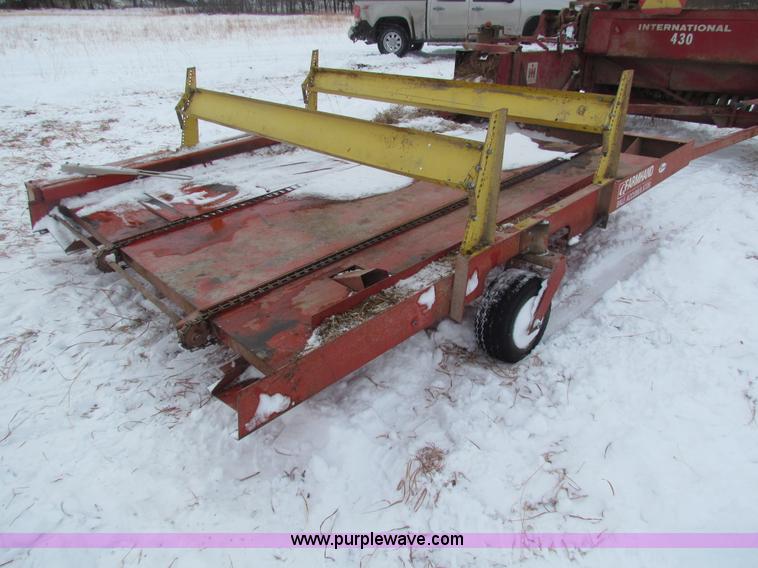 image for item AJ9461 International 430 square baler and Farmhand accumulator