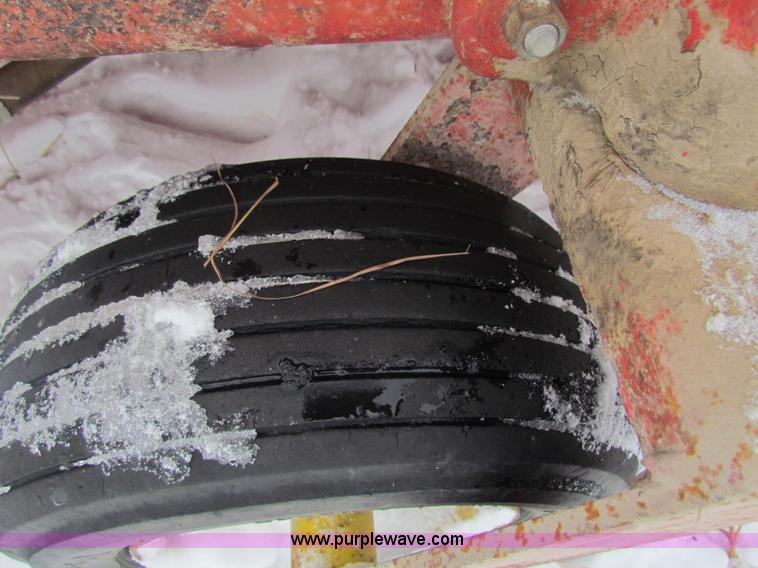 image for item AJ9461 International 430 square baler and Farmhand accumulator