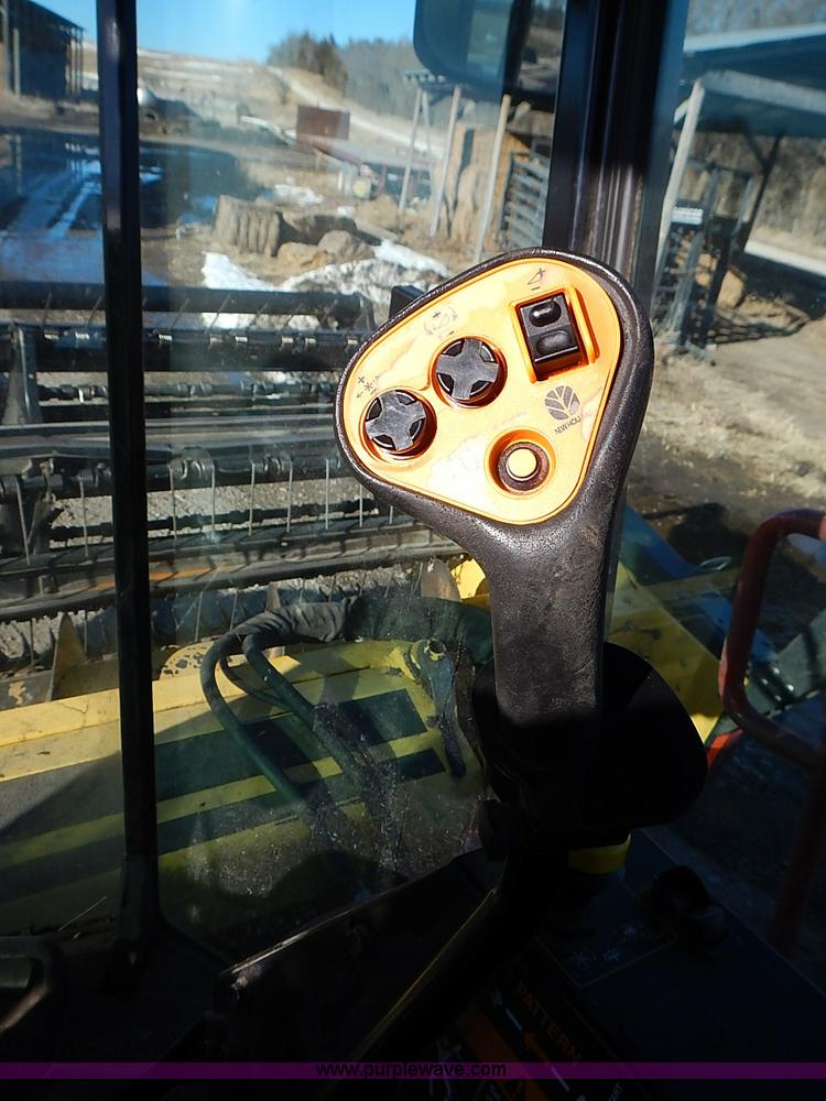 image for item I9407 2005 New Holland HW305 self-propelled windrower