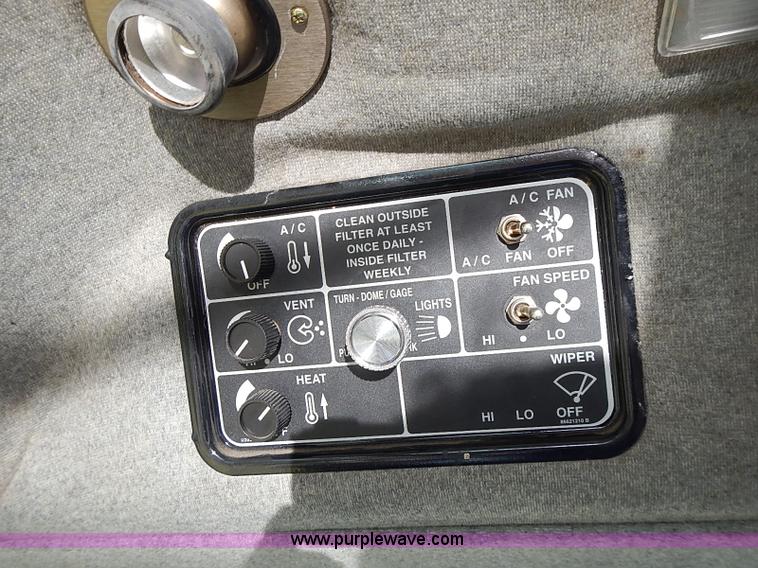 image for item I9407 2005 New Holland HW305 self-propelled windrower