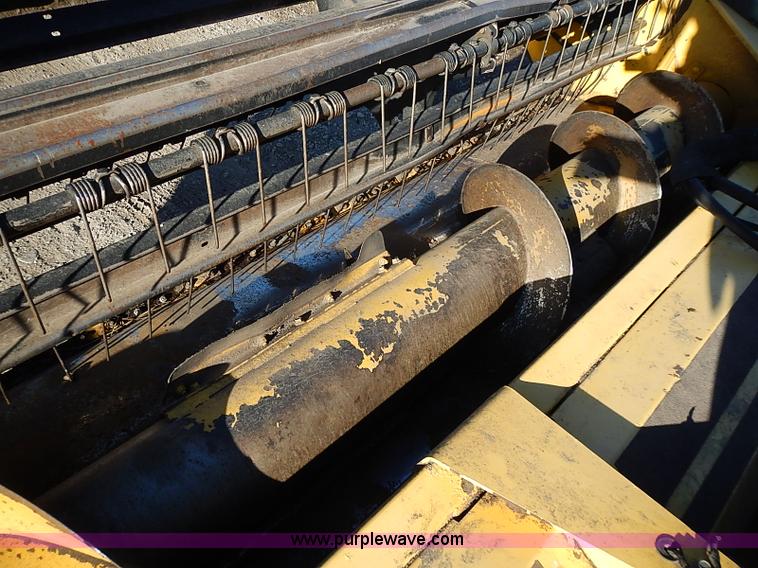 image for item I9407 2005 New Holland HW305 self-propelled windrower