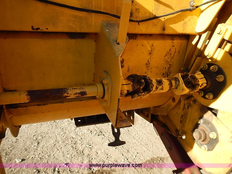 image for item I9407 2005 New Holland HW305 self-propelled windrower