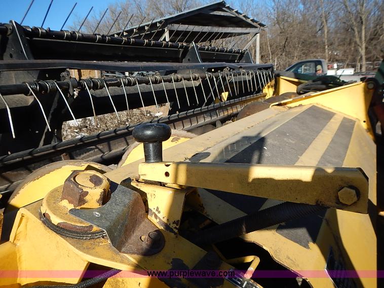 image for item I9407 2005 New Holland HW305 self-propelled windrower