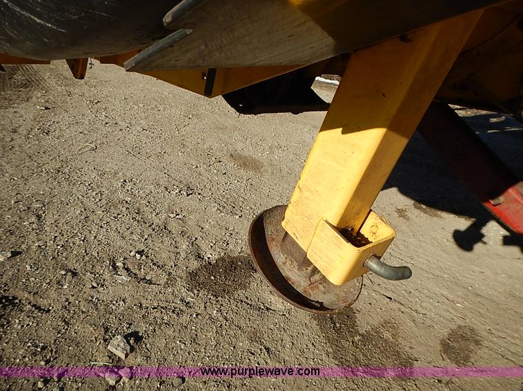 image for item I9407 2005 New Holland HW305 self-propelled windrower