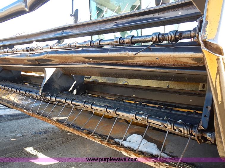 image for item I9407 2005 New Holland HW305 self-propelled windrower