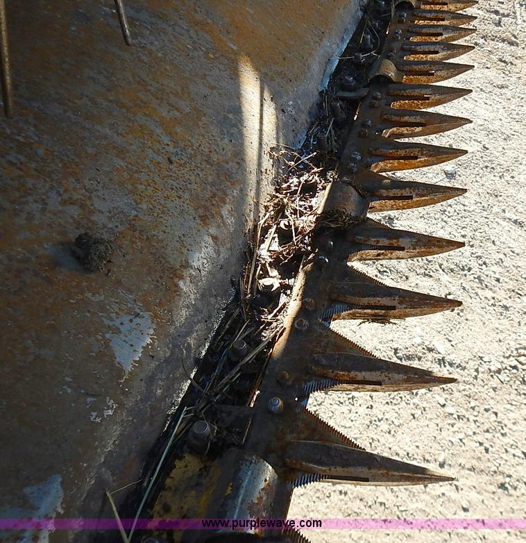 image for item I9407 2005 New Holland HW305 self-propelled windrower