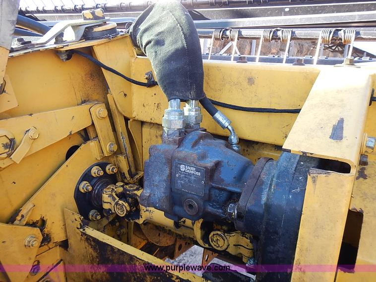 image for item I9407 2005 New Holland HW305 self-propelled windrower