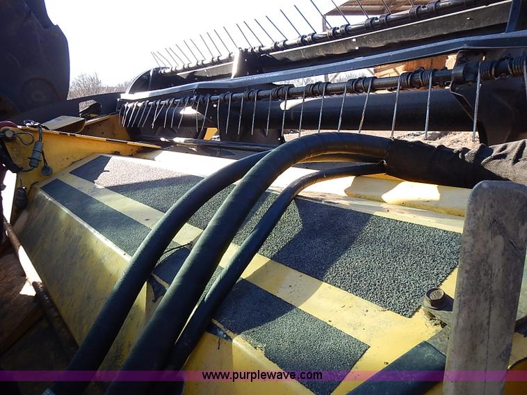 image for item I9407 2005 New Holland HW305 self-propelled windrower