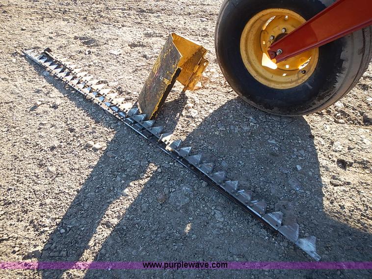 image for item I9407 2005 New Holland HW305 self-propelled windrower