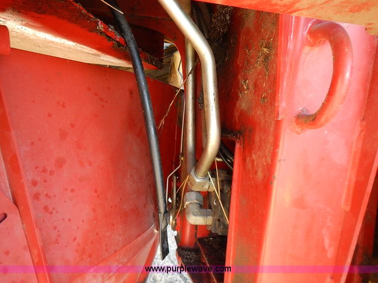 image for item I9407 2005 New Holland HW305 self-propelled windrower