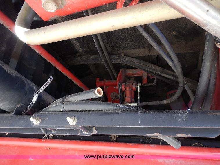 image for item I9407 2005 New Holland HW305 self-propelled windrower