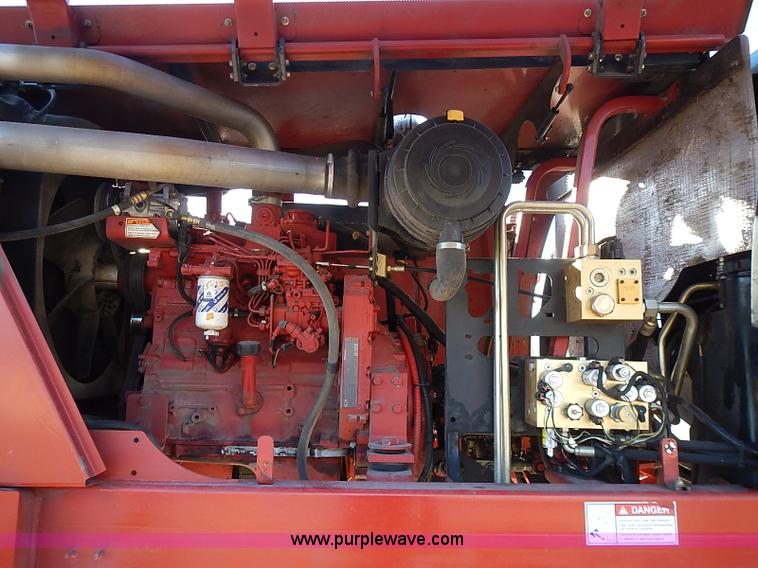 image for item I9407 2005 New Holland HW305 self-propelled windrower