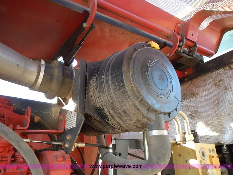 image for item I9407 2005 New Holland HW305 self-propelled windrower