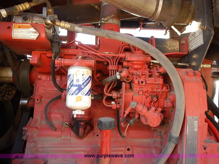 image for item I9407 2005 New Holland HW305 self-propelled windrower