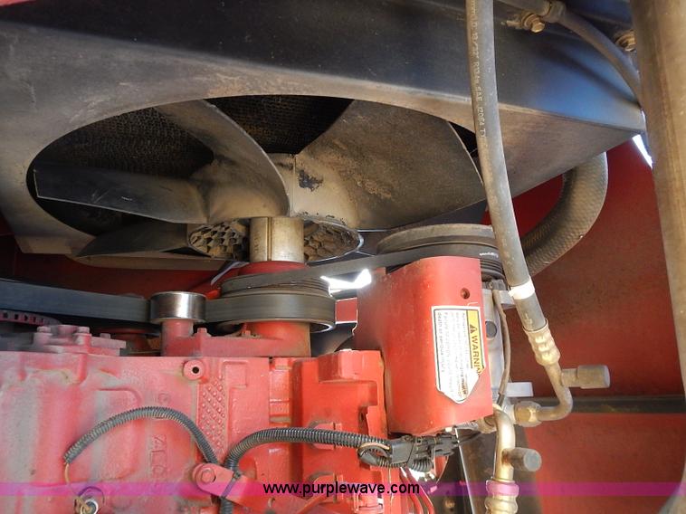 image for item I9407 2005 New Holland HW305 self-propelled windrower