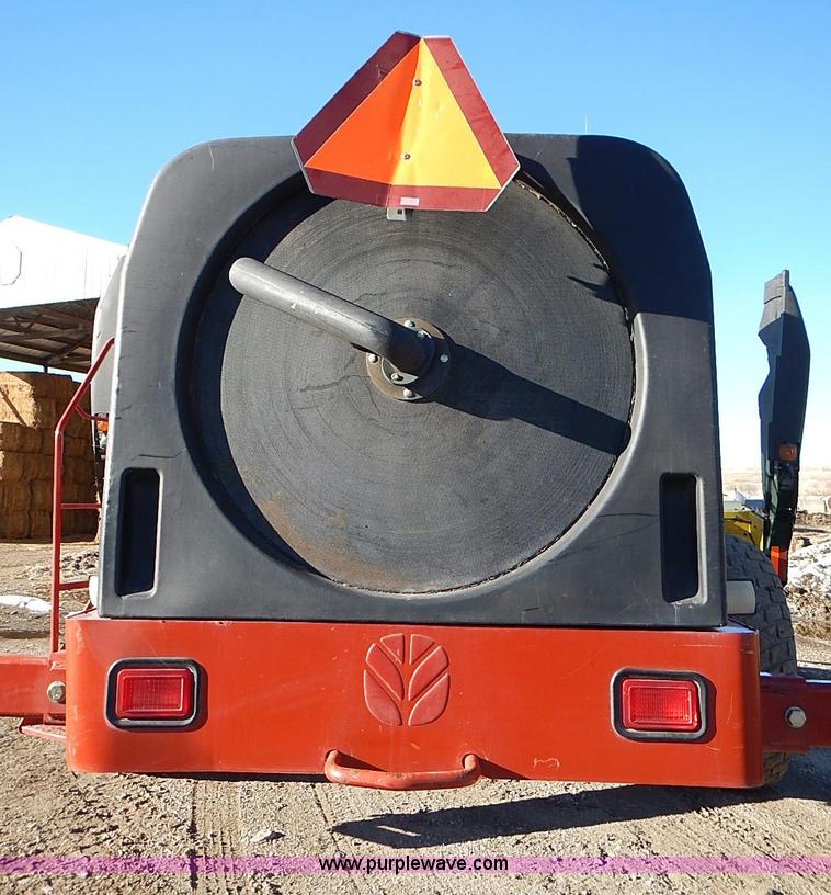 image for item I9407 2005 New Holland HW305 self-propelled windrower