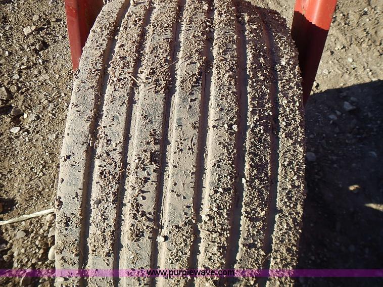 image for item I9407 2005 New Holland HW305 self-propelled windrower