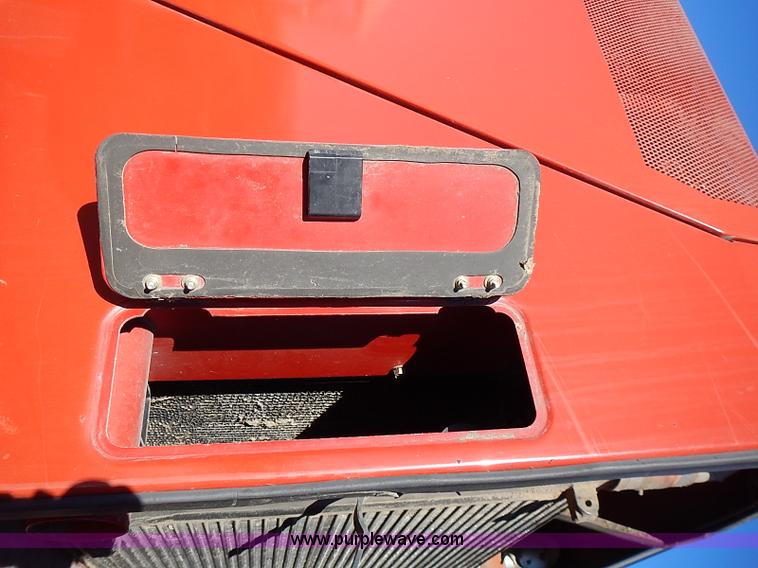 image for item I9407 2005 New Holland HW305 self-propelled windrower