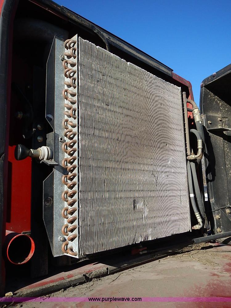 image for item I9407 2005 New Holland HW305 self-propelled windrower