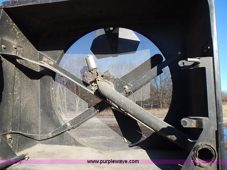 image for item I9407 2005 New Holland HW305 self-propelled windrower