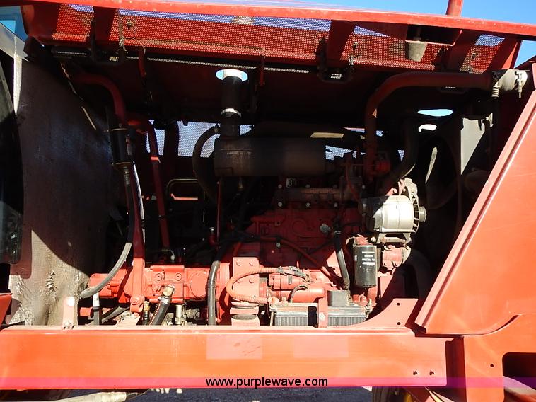 image for item I9407 2005 New Holland HW305 self-propelled windrower