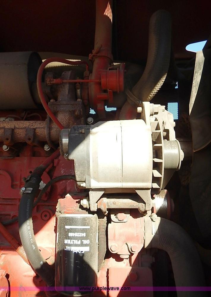 image for item I9407 2005 New Holland HW305 self-propelled windrower