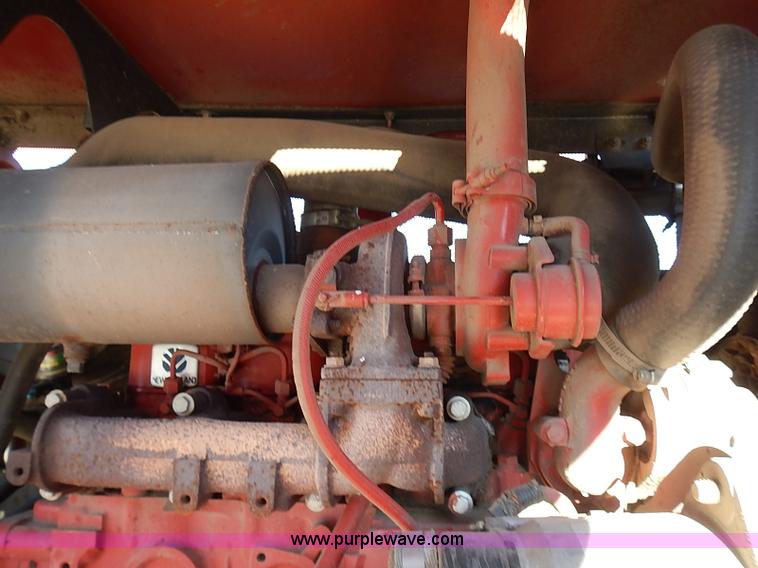 image for item I9407 2005 New Holland HW305 self-propelled windrower