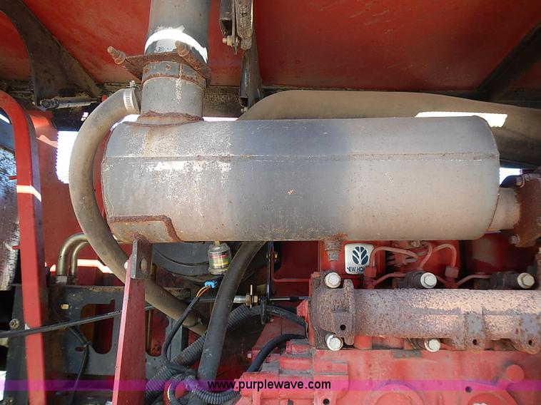 image for item I9407 2005 New Holland HW305 self-propelled windrower